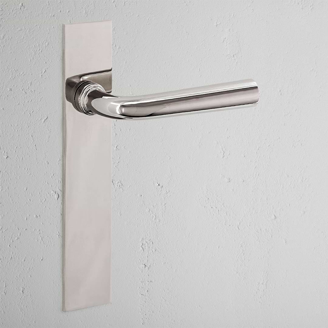Apsley Long Plate Sprung Door Handle Polished Nickel Finish on White Background