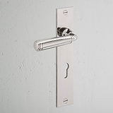 Digby Long Plate Sprung Door Handle & Euro Lock Polished Nickel Finish on White Background at an Angle