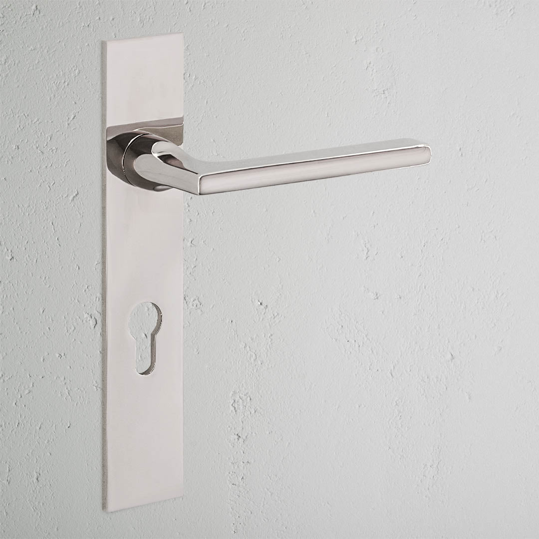 Clayton Long Plate Sprung Door Handle & Euro Lock Polished Nickel Finish on White Background 