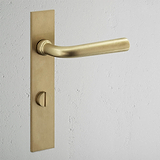 Apsley Long Plate Sprung Door Handle & Thumbturn Antique Brass Finish on White Background 