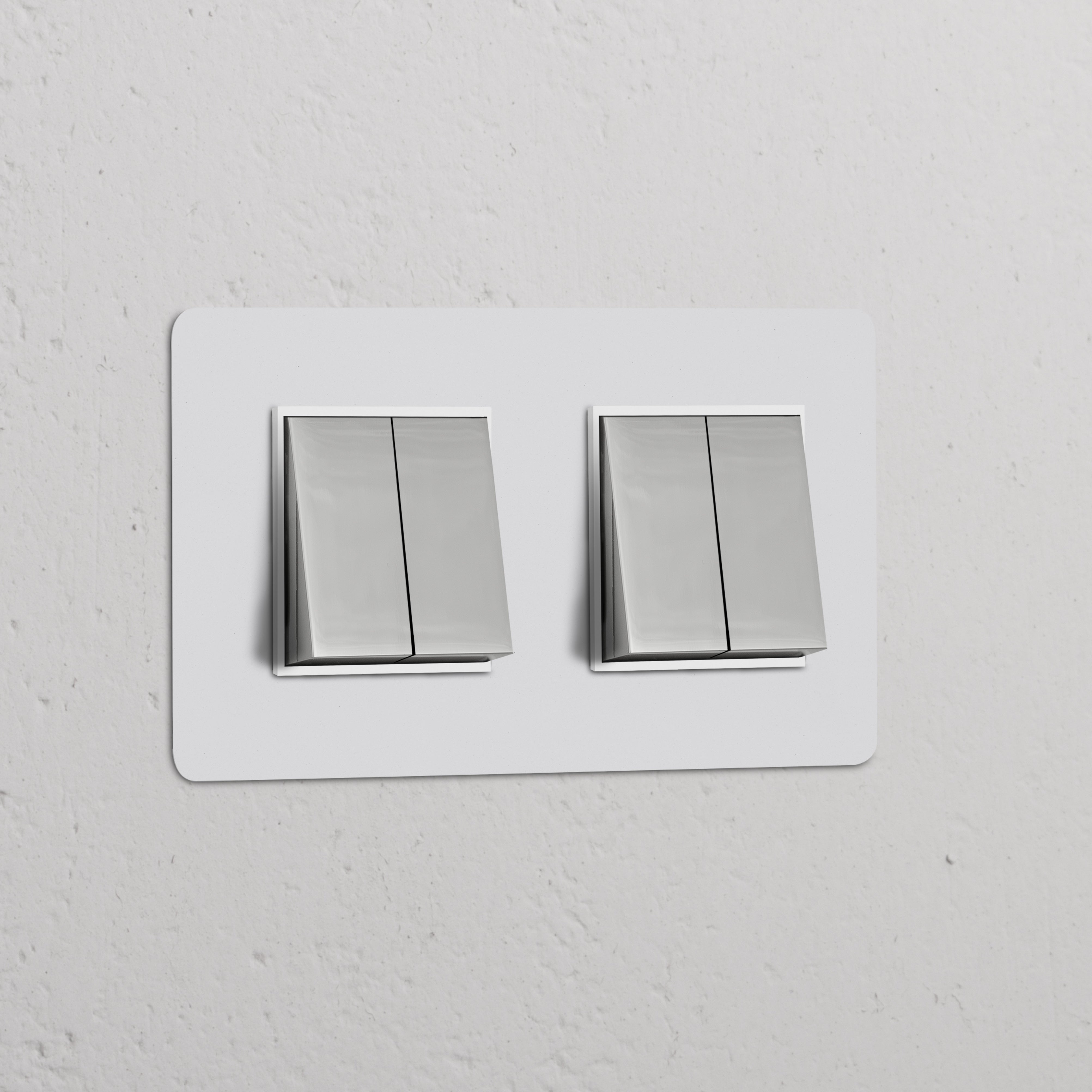 Double 4x Rocker Switch, polished nickel finish, paintable white surface, for lighting control.