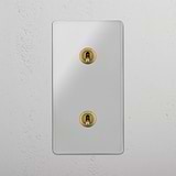 Stylish Double Vertical Toggle Switch in Clear Antique Brass on White Background