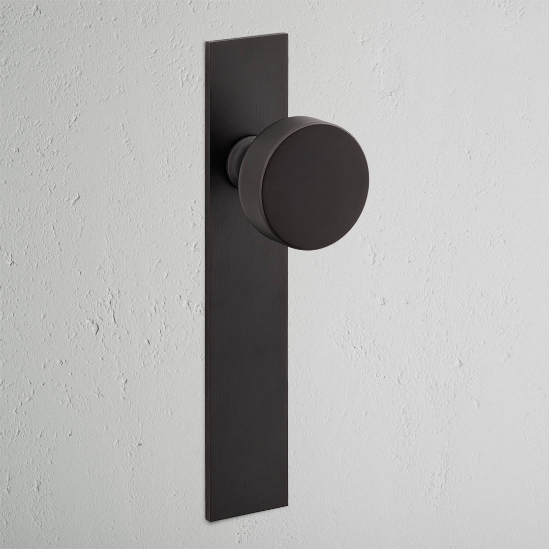 Onslow Long Plate Sprung Door Knob - Bronze