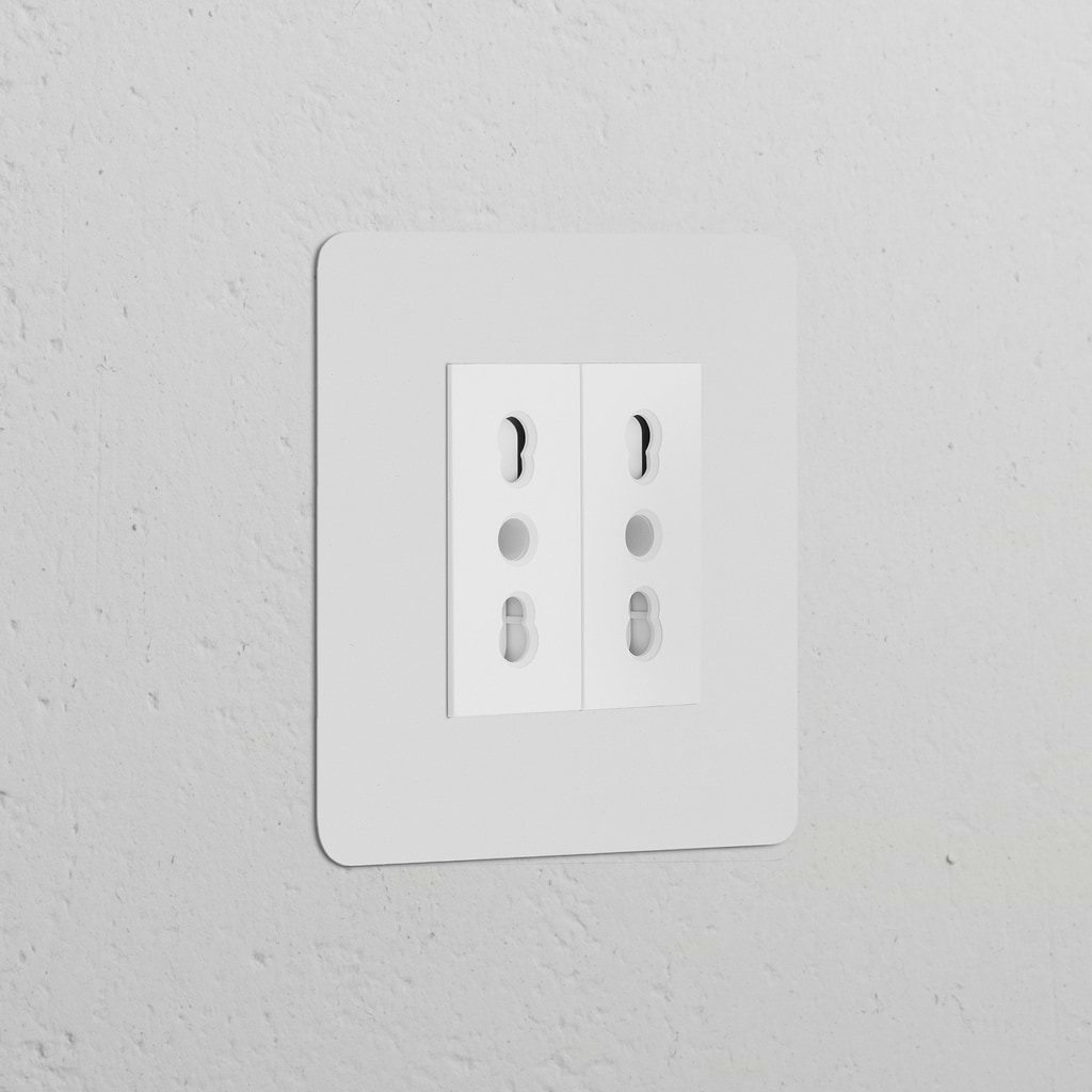Single 2x Bipasso Power Module in paintable white, features childproof double electrical sockets for single use.