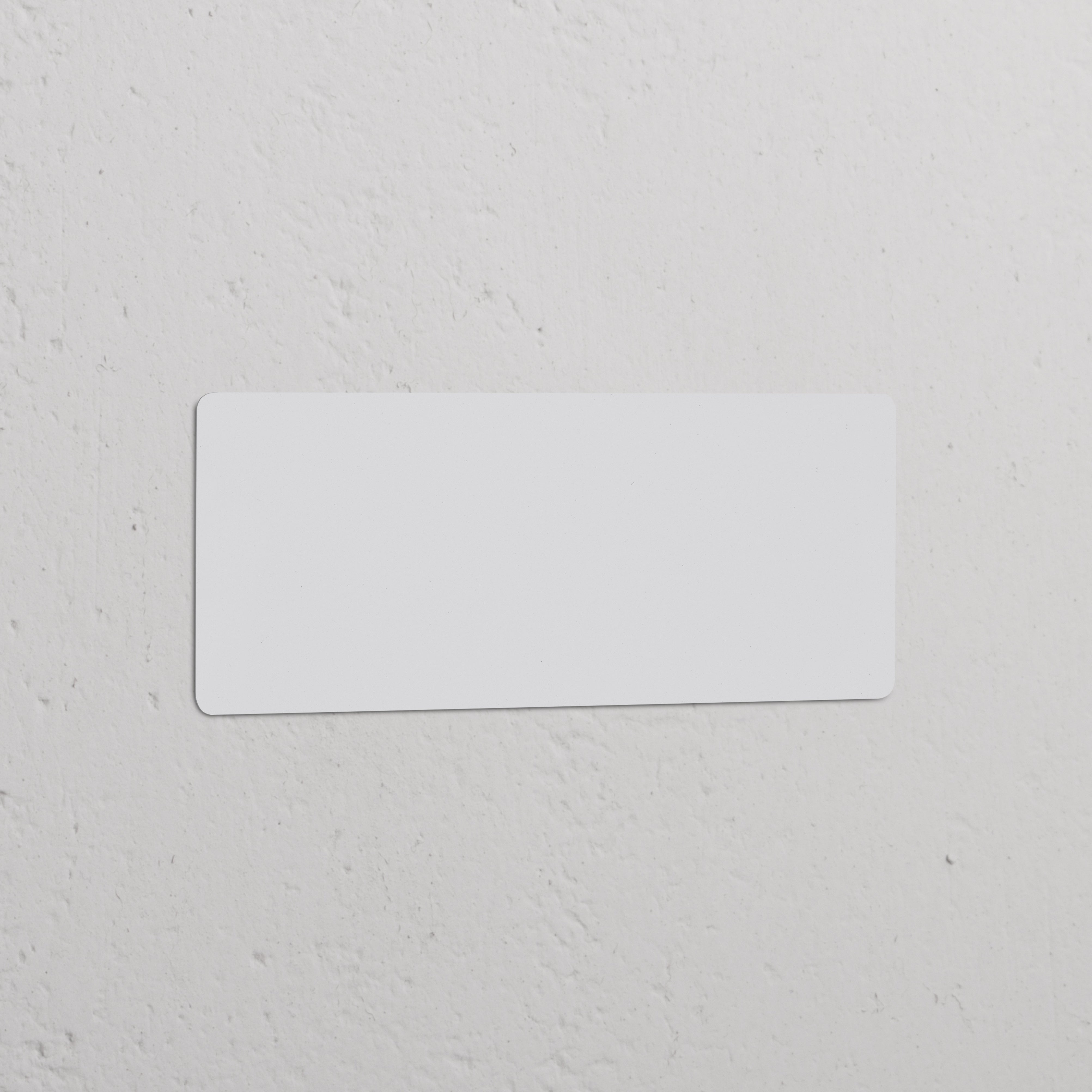 Paintable triple blank switch plate for EU wall installations, designed for customization and a seamless fit.