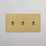 Elegant Double Toggle Switch in Antique Brass finish on White Background