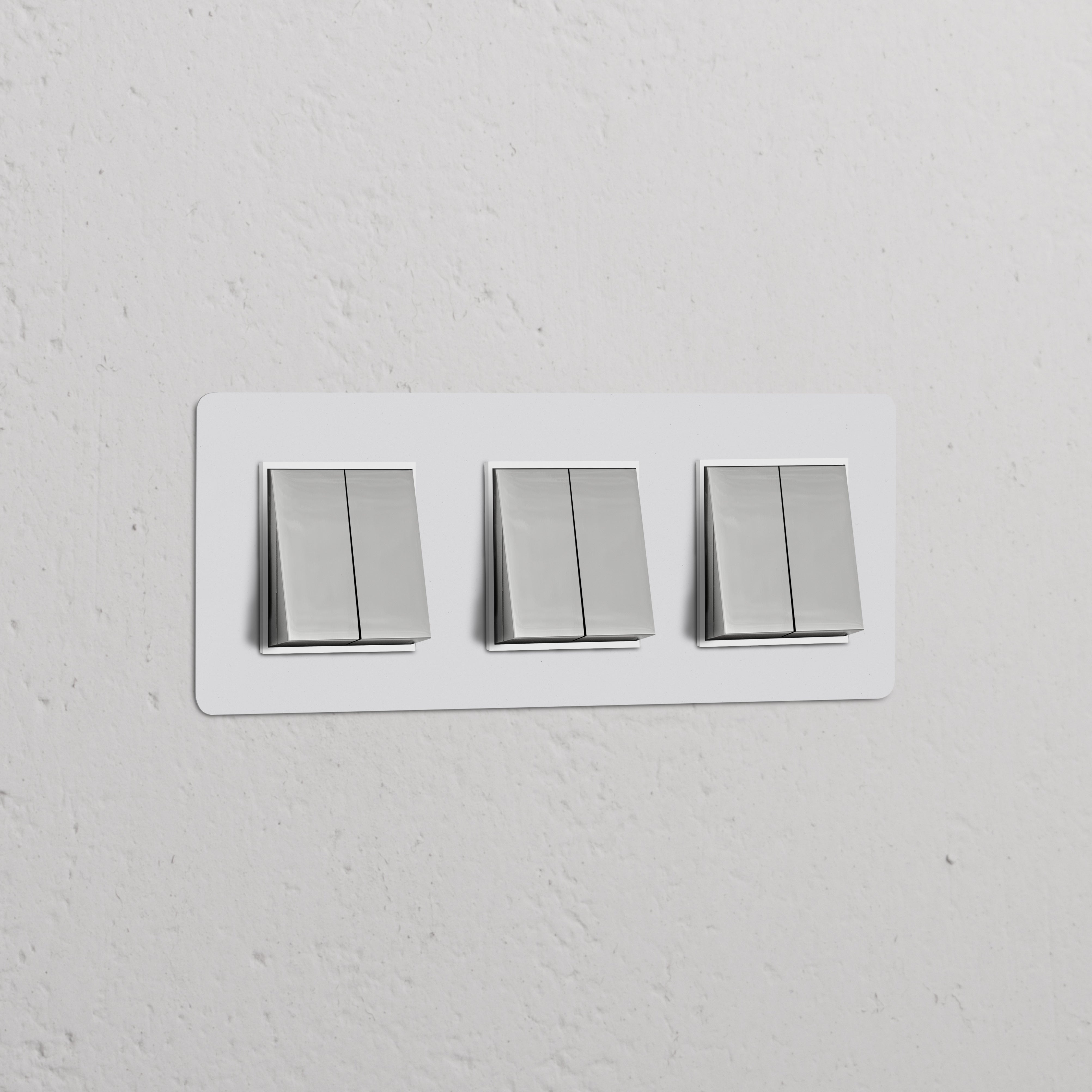 Triple 6x Rocker Switch Paintable Polished Nickel White on a white textured wall, part of Triple Switches & Dimmers.