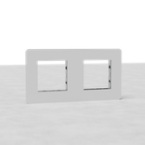 Double 45mm EU paintable switch plate on a light gray surface, ideal for seamless integration in EU settings.