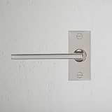 Clayton Short Plate Fixed Door Handle Polished Nickel Finish on White Background right Facing Front View