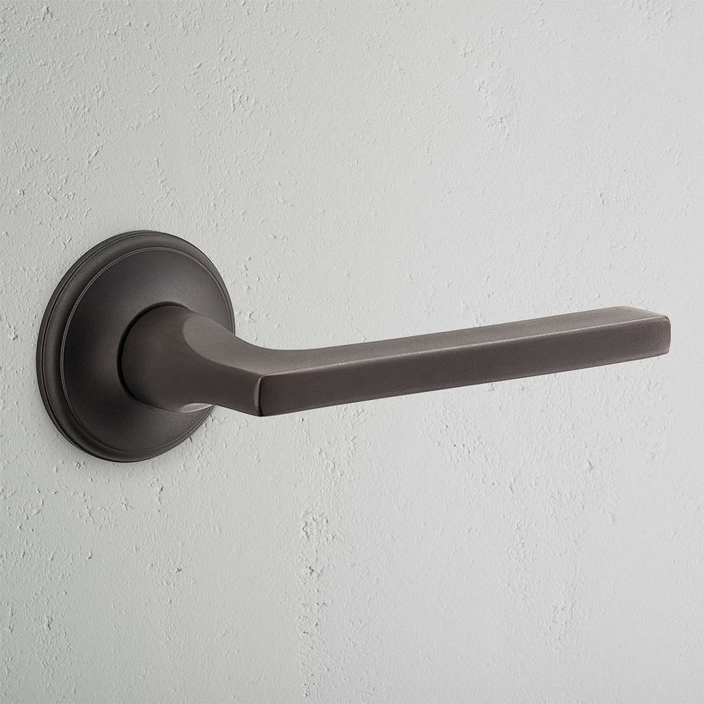 Clayton Unsprung Door Handle Bronze Finish on White Background