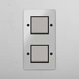 Contemporary Vertical Double Rocker Switch in Clear Polished Nickel Black - Efficient Lighting System on White Background