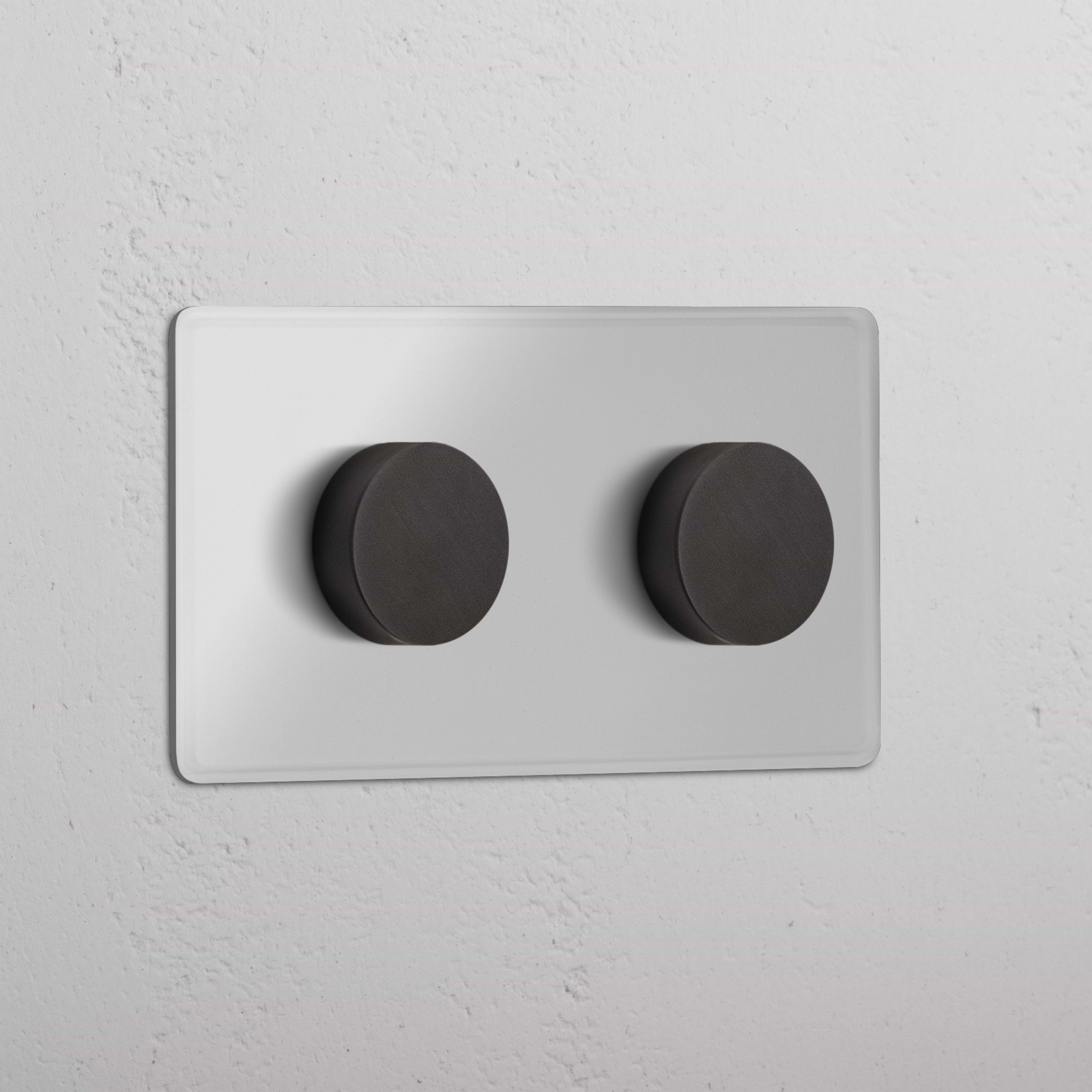 Clear Bronze Double 2x Multiway Dimmer Switch with two round black knobs on a rectangular plate.