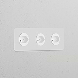 Triple 3x Swiss Type J Power Module with round paintable white sockets, seamlessly integrated into a white wall.