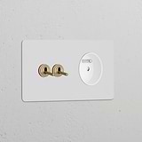 Double 2x Toggle Switch with French/Belgian Type E Module in Paintable Antique Brass on White.