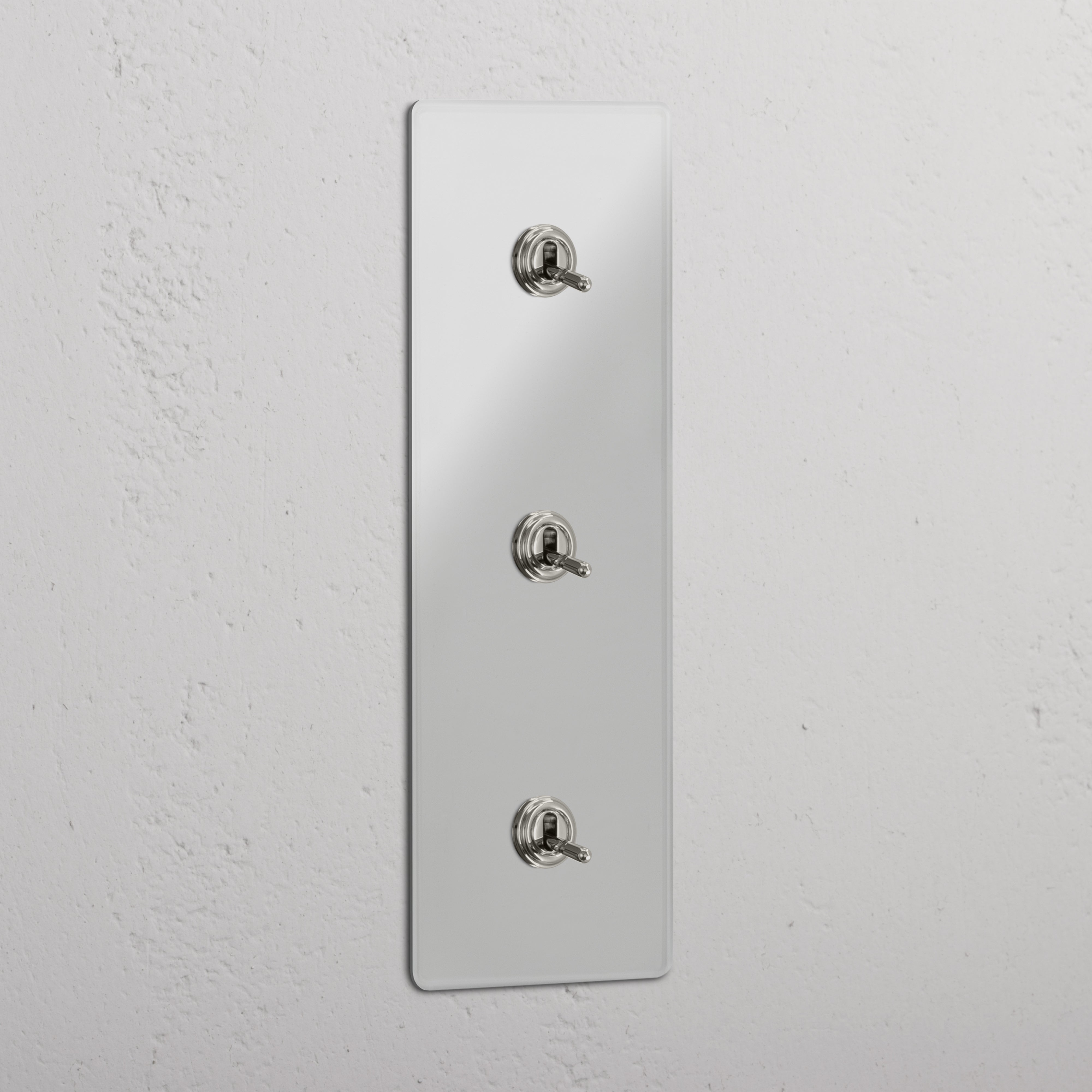 Vertical Triple Toggle Switch in Clear Polished Nickel - User-friendly Lighting Accessory