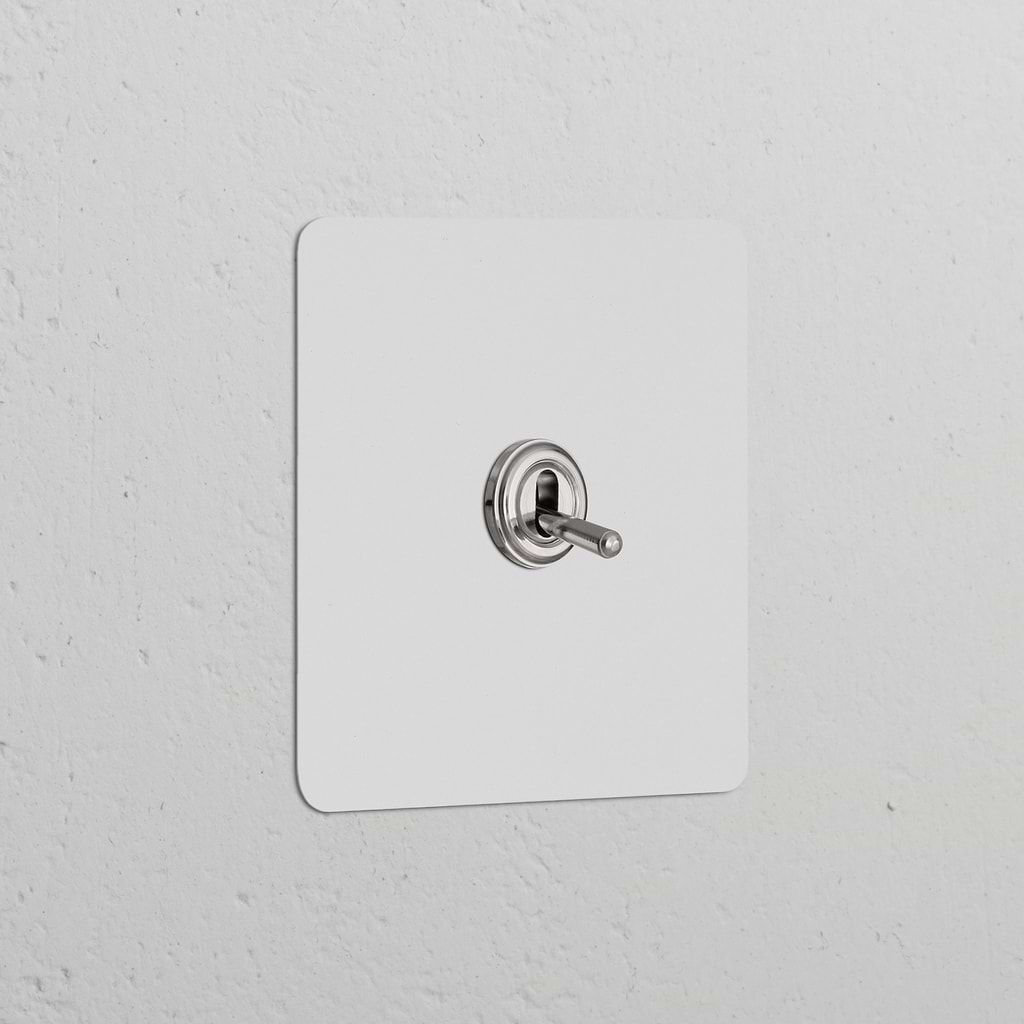 Single toggle switch, paintable polished nickel finish, part of the Single Switches & Dimmers collection.