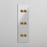 Vertical Triple Toggle Switch in Clear Antique Brass with 6 Levers - Robust Lighting Solution