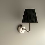Small Malvern Wall Light in Deep Green at an angle and affixed to a wall 