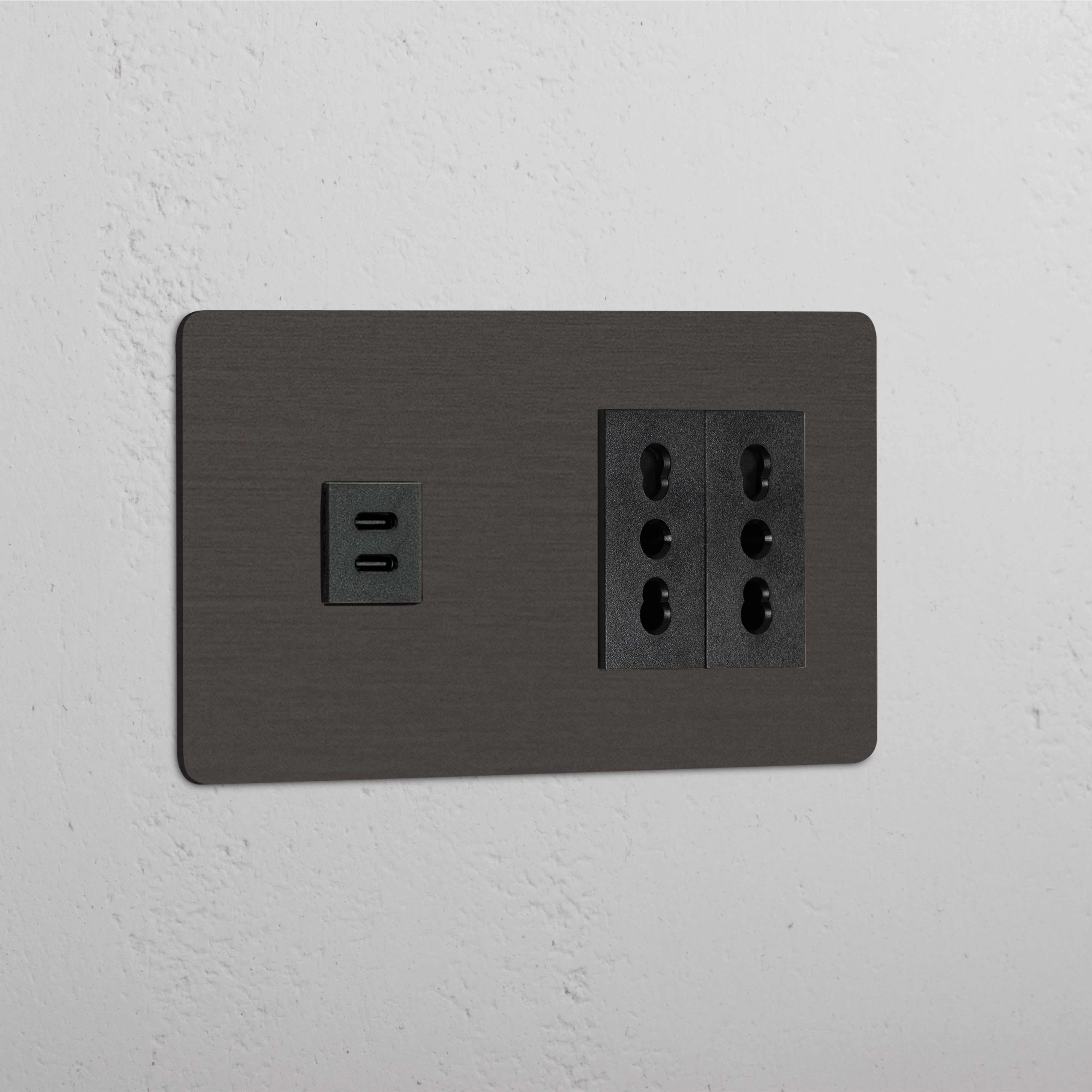 Bronze Black Double Sockets with 30W USB & 2x Bipasso Module on white wall, combining USB and power options.