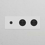 Triple Toggle Switch with 2x French/Belgian Type E Power Module in Paintable Bronze Black on a white wall.