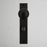 Poplar Long Plate Sprung Door Knob & Thumbturn Bronze Finish on White Background right Facing Front View