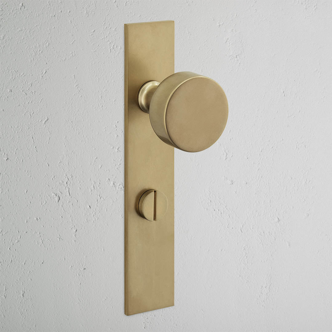 Onslow Long Plate Sprung Door Knob & Thumbturn - Antique Brass