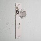 Poplar Long Plate Sprung Door Knob & Euro Lock Polished Nickel Finish on White Background at an Angle