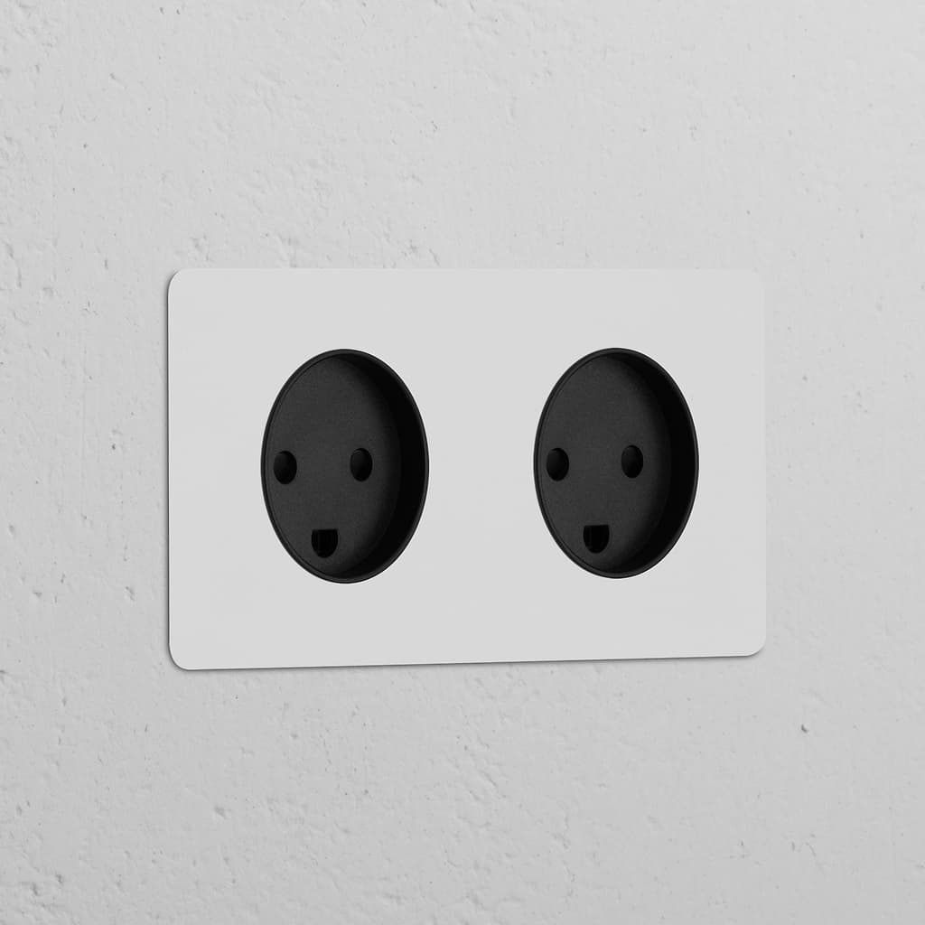 Double 2x Danish Type K power module, paintable black, featuring two round sockets for electrical connectivity.
