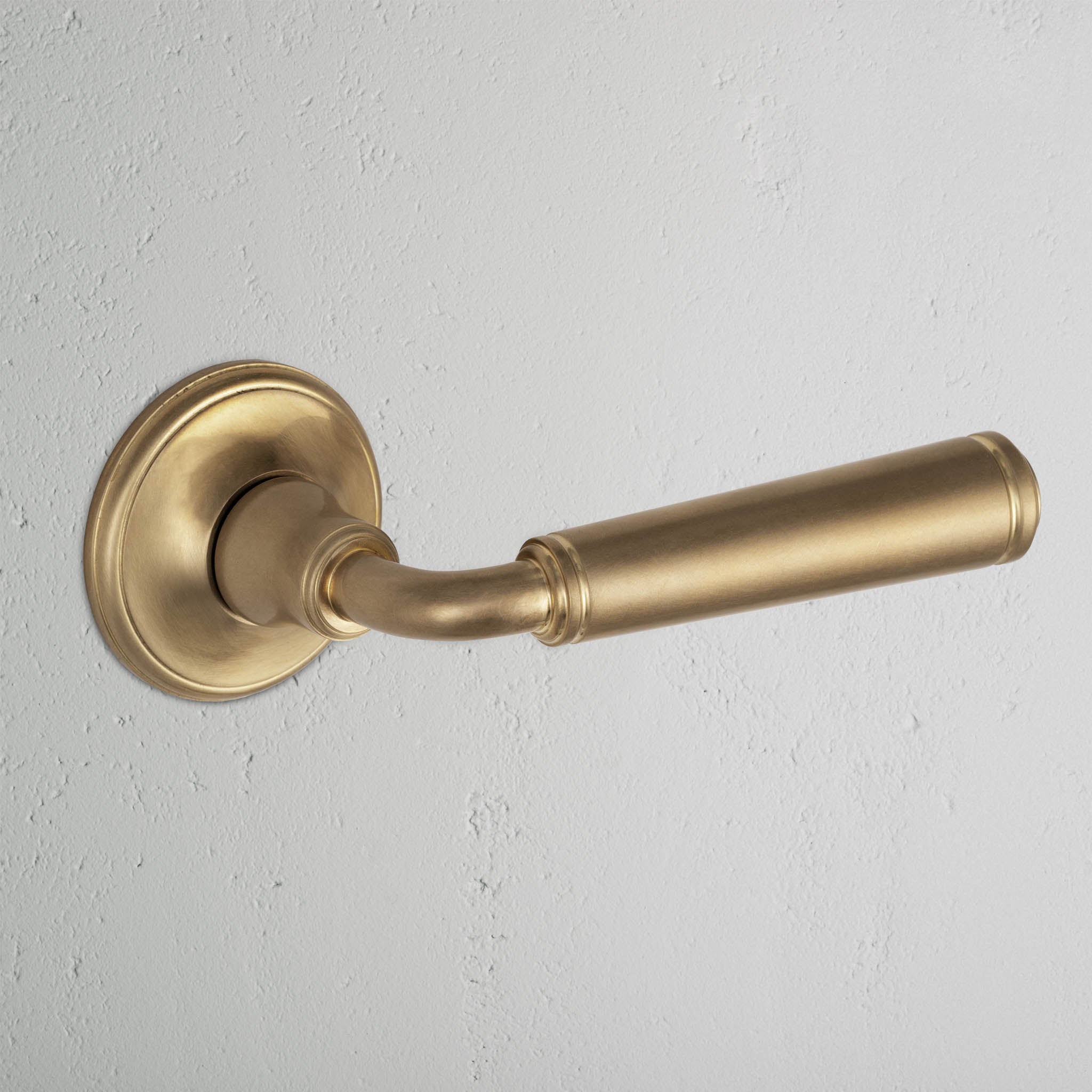Digby Sprung Door Handle - Antique Brass