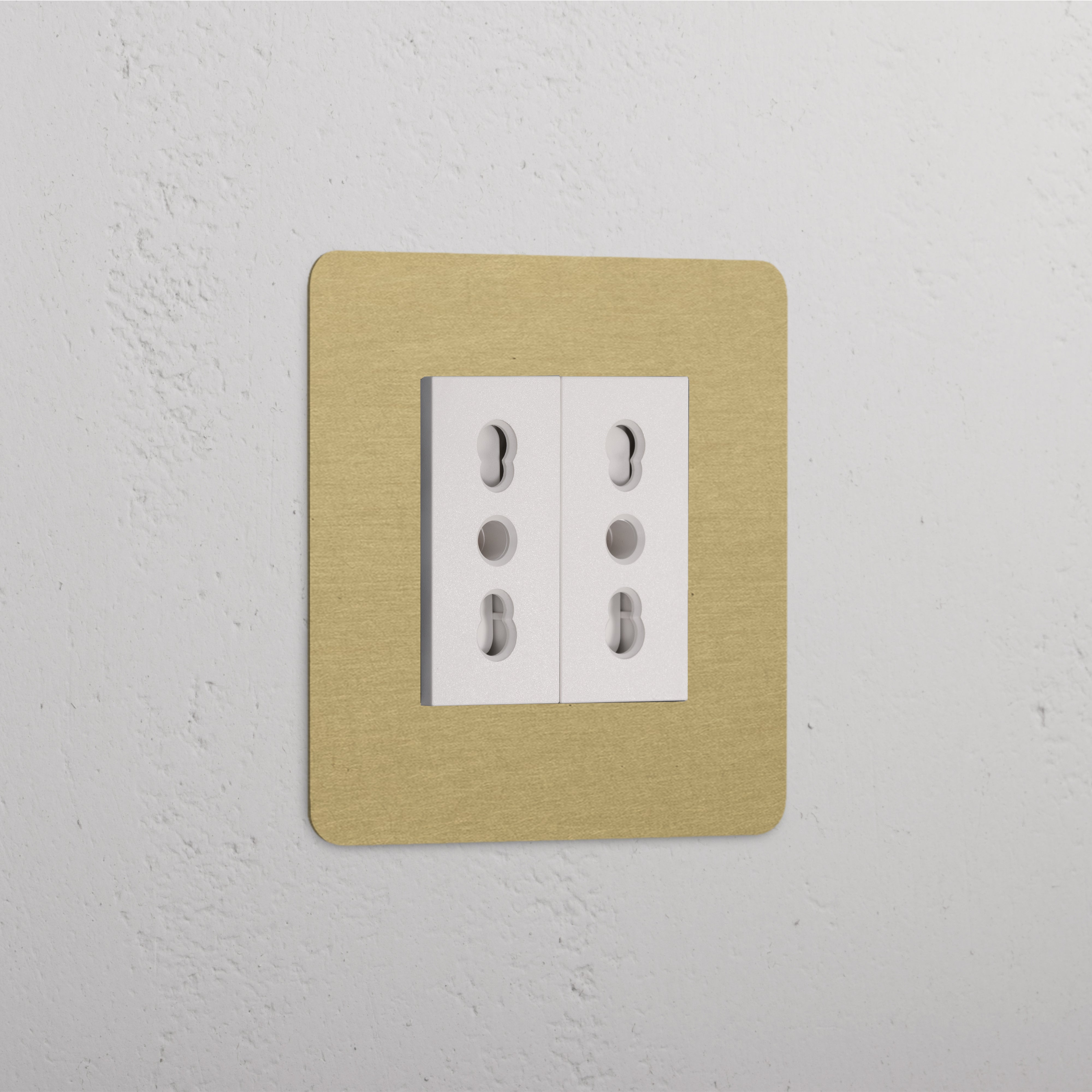 Single 2x Bipasso Module in Antique Brass White finish, part of Single Sockets & Modules, on a white wall.