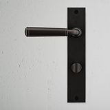 Digby Long Plate Sprung Door Handle & Thumbturn Bronze Finish on White Background right Facing Front View