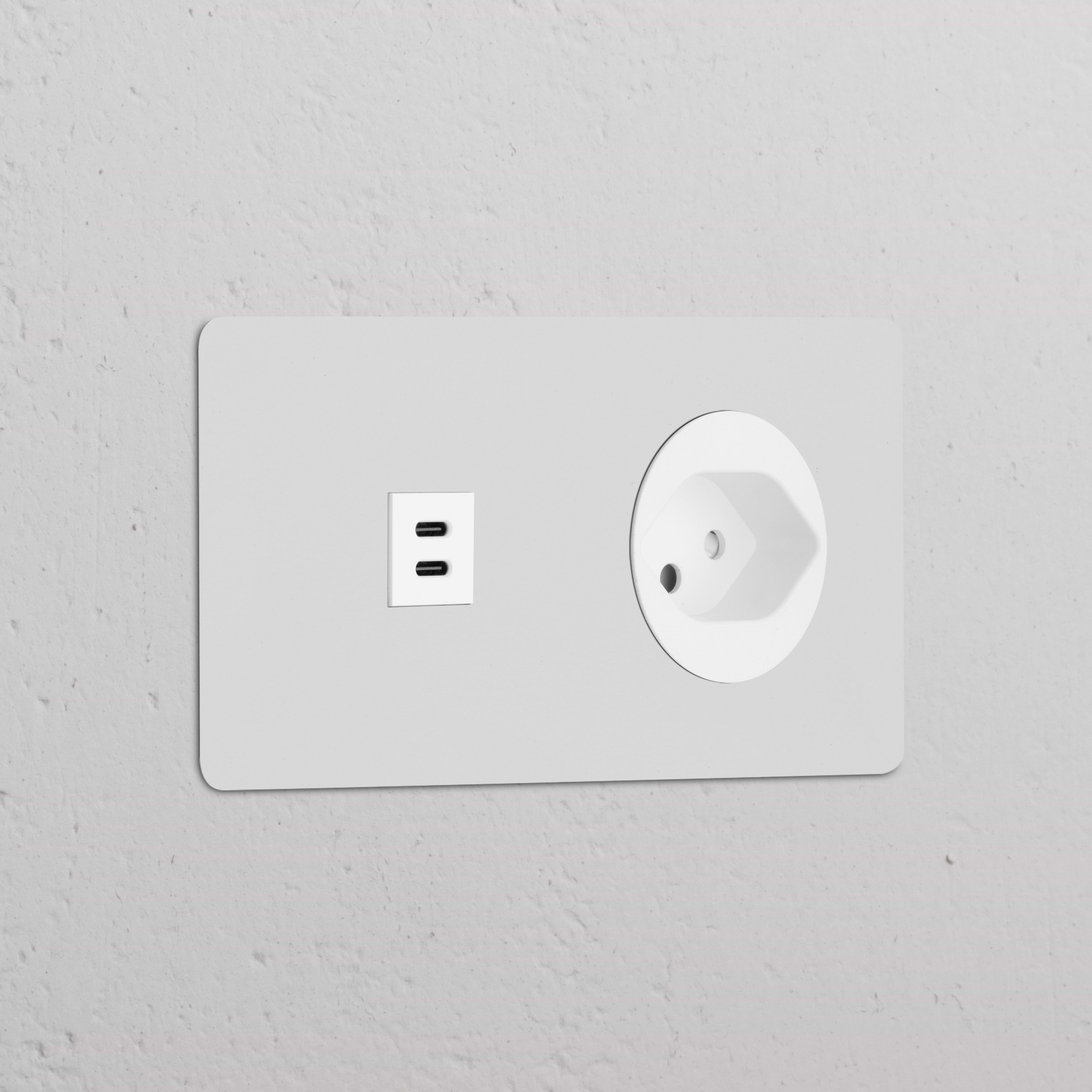 White round module with double USB 30W & Swiss Type J socket, paintable for matching decor in modern spaces.