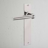 Harper Long Plate Sprung Door Handle Polished Nickel Finish on White Background at an Angle