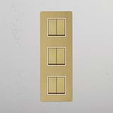 Versatile Triple Vertical Rocker Switch in Antique Brass White for Easy Operation on White Background