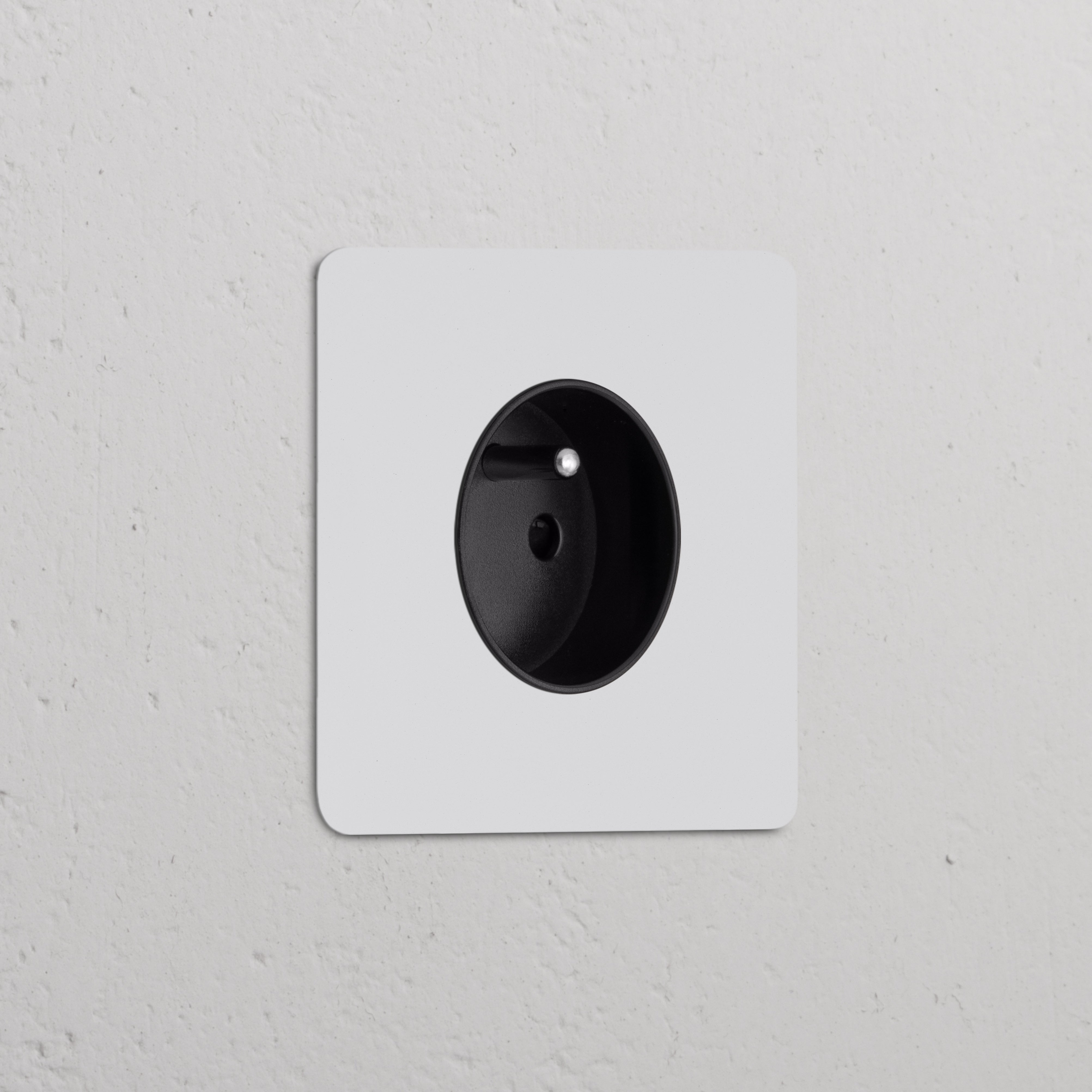 Single French/Belgian Type E Power Module Round in paintable black, suitable for single sockets and modules.