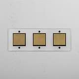 Triple Rocker Switch in Clear Antique Brass Black - Stylish Light Control Solution on White Background