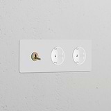 Triple toggle switch & 2x Schuko Type F sockets, paintable antique brass on white surface, Triple Sockets & Modules.
