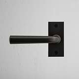 Apsley Short Plate Sprung Door Handle Bronze Finish on White Background right Facing Front View