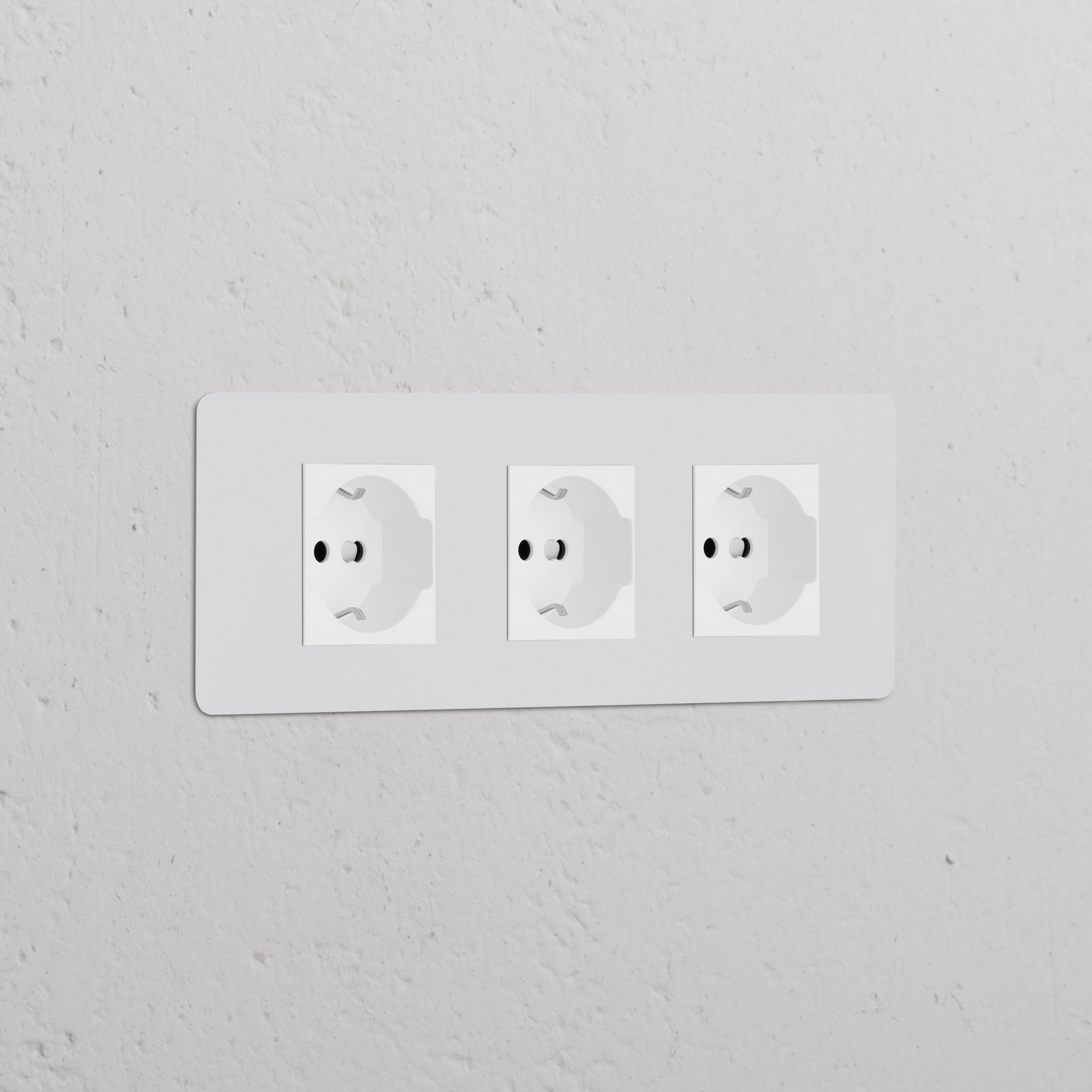 Triple 3x Schuko/Bipasso Power Module in paintable white, offering three versatile sockets for seamless integration.