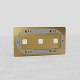 Triple Switch Plate in Antique Brass - Timeless European Home Accessory on White Background