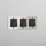 Six-Position Triple Rocker Switch in Clear Bronze Black - Modern Light Control Solution