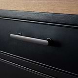 Bronze Milliner Handle on Black Furniture