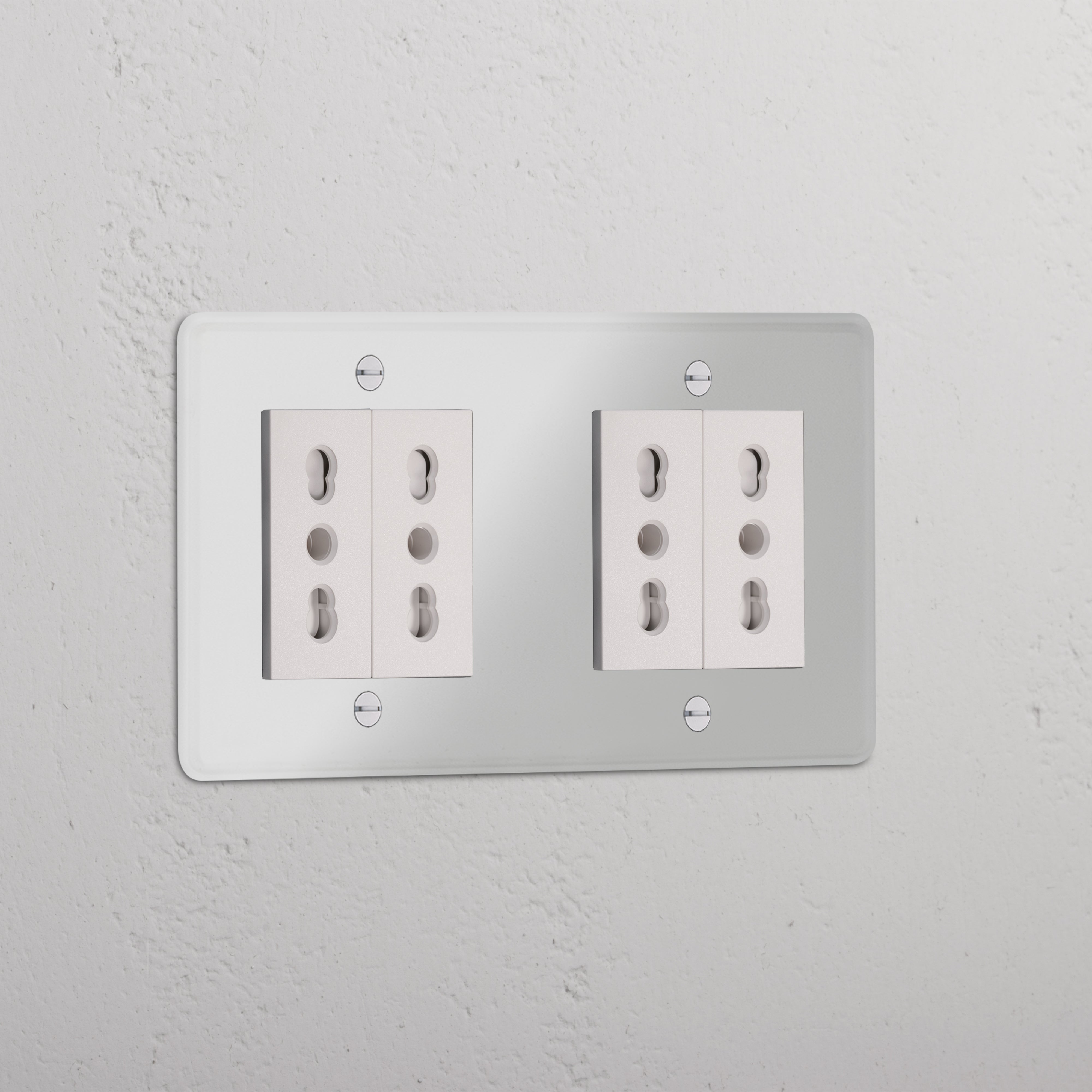 Clear white Double 4x Bipasso Module for double sockets, integrated into a textured white wall.