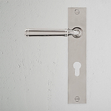 Digby Long Plate Sprung Door Handle & Euro Lock Polished Nickel Finish on White Background right Facing Front View