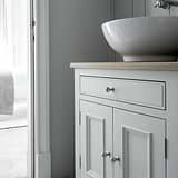 Polished Nickel Furniture Knob on White Cupboard Furniture