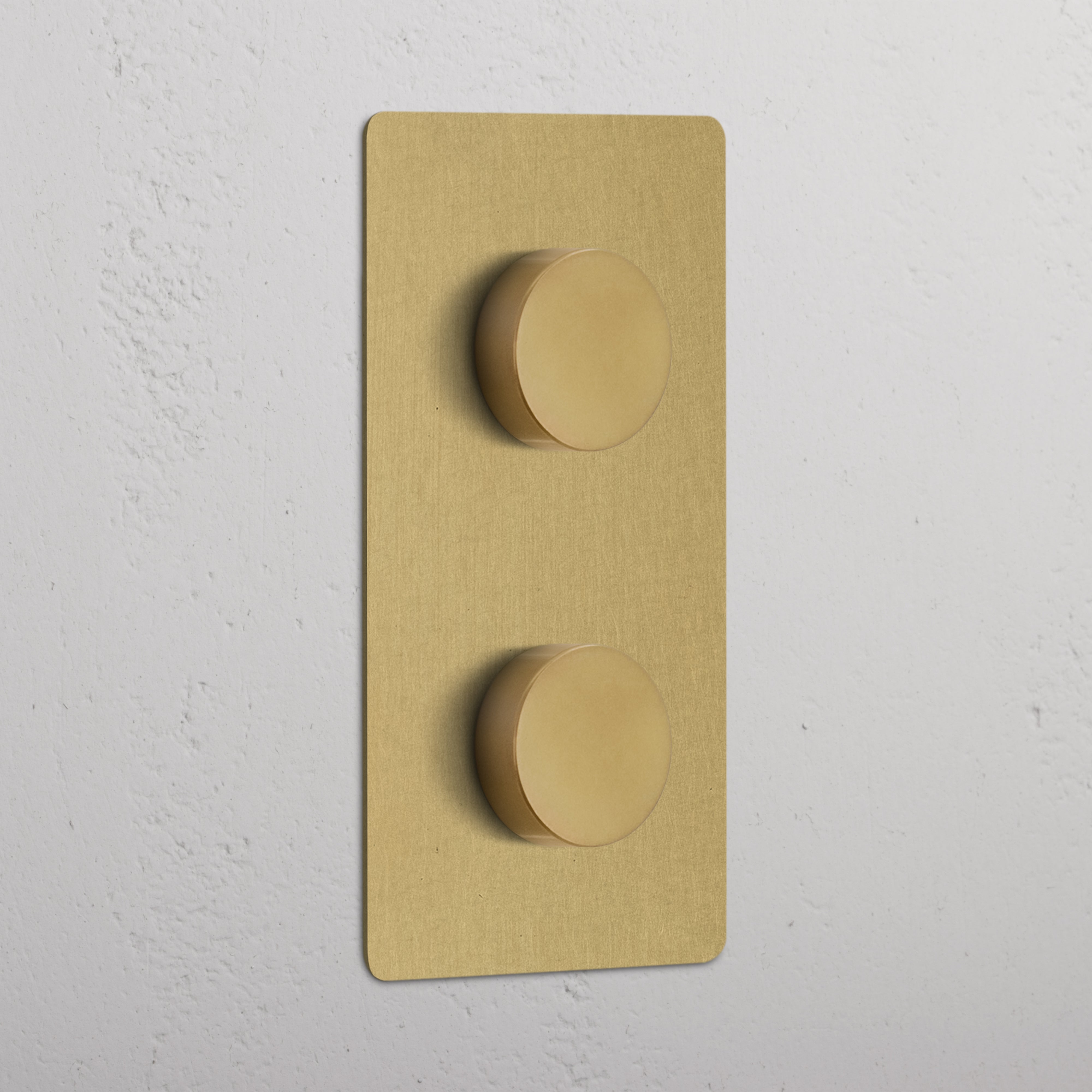 Antique Brass Double 2x Vertical Multiway Dimmer Switch with two round knobs on a white wall.