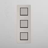 High Capacity Vertical Light Control Switch: Polished Nickel Black Triple 3x Vertical Rocker Switch on White Background