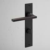 Clayton Long Plate Sprung Door Handle & Thumbturn Bronze Finish on White Background at an Angle