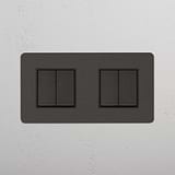 Elegant Double Rocker Switch in Bronze Black with 4 Positions on White Background
