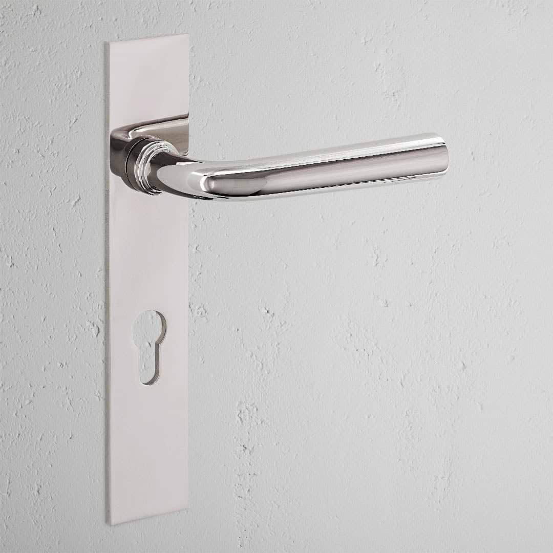 Apsley Long Plate Sprung Door Handle & Euro Lock Polished Nickel Finish on White Background